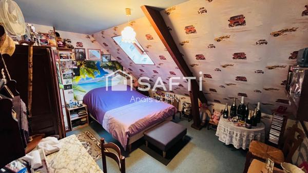 Maison composée de 3 chambres et 2 salles de bain