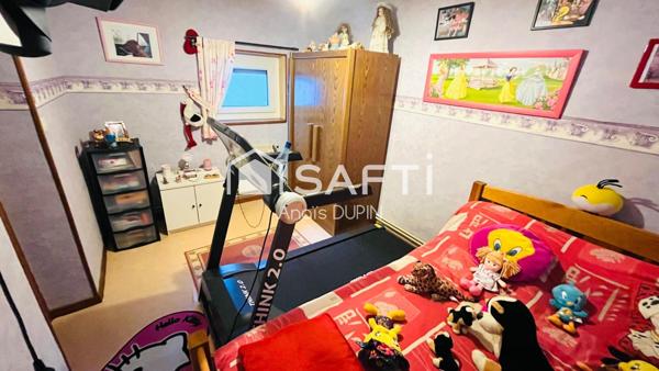 Maison composée de 3 chambres et 2 salles de bain