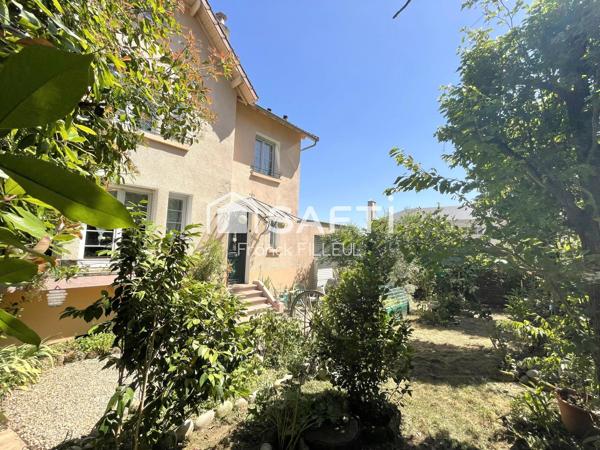 Maison de famille avec garage et jardin