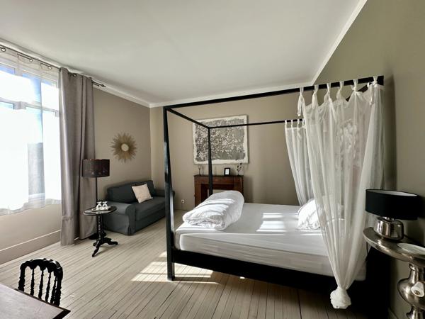 Belle maison de ville offrant 11 chambres