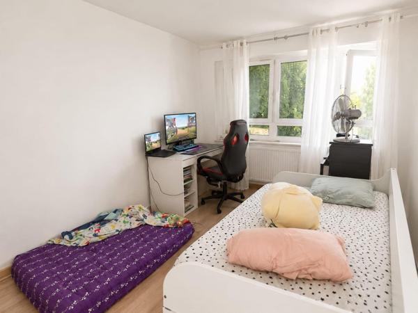 Appartement familial 4 pièces de 85,12 m² avec balcon, parking et nombreux rangements