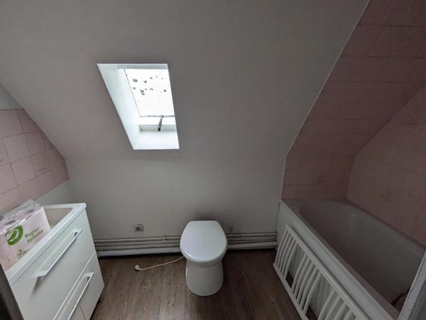 immeuble 3 appartements + local commercial (actuellement loué)