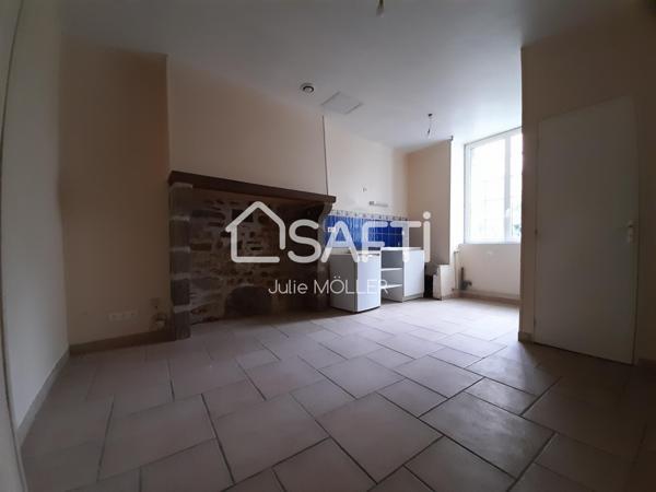 Immeuble à rénover comprenant 4 lots dont 1 local commercial