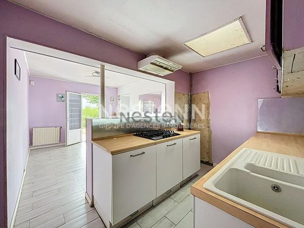 Maison en pierre avec jardin