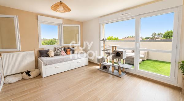 Appartement à vendre de 2 pièces de 51 m² avec place de parking couverte - Ascenseur