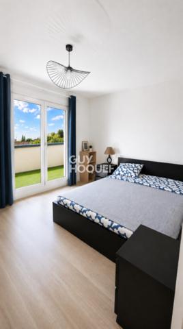Appartement à vendre de 2 pièces de 51 m² avec place de parking couverte - Ascenseur