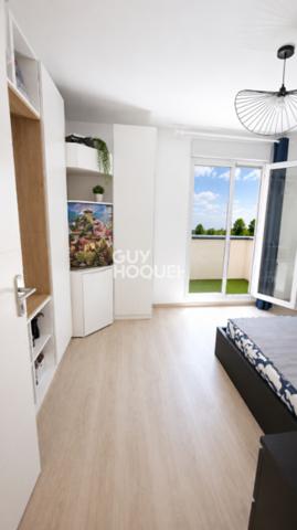 Appartement à vendre de 2 pièces de 51 m² avec place de parking couverte - Ascenseur