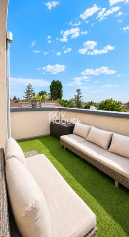 Appartement à vendre de 2 pièces de 51 m² avec place de parking couverte - Ascenseur