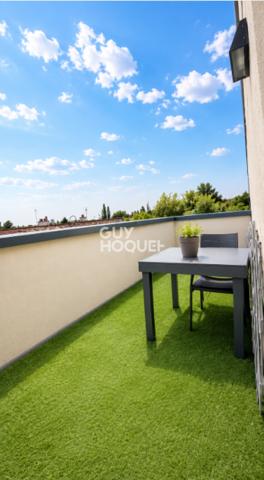 Appartement à vendre de 2 pièces de 51 m² avec place de parking couverte - Ascenseur
