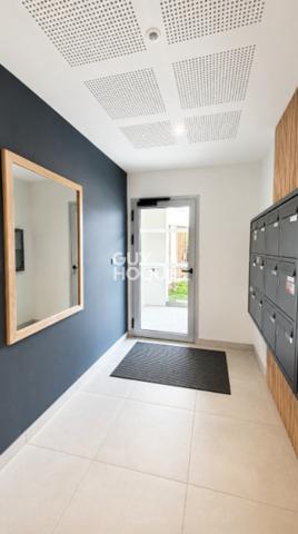 Appartement à vendre de 2 pièces de 51 m² avec place de parking couverte - Ascenseur