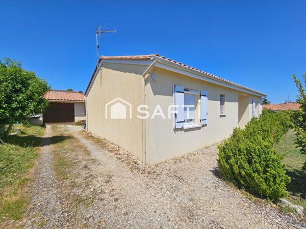 Maison plain pied avec garage proche du centre-ville