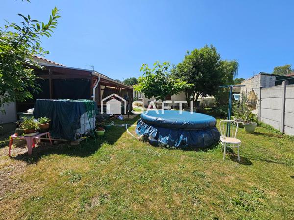 Maison plain pied avec garage proche du centre-ville