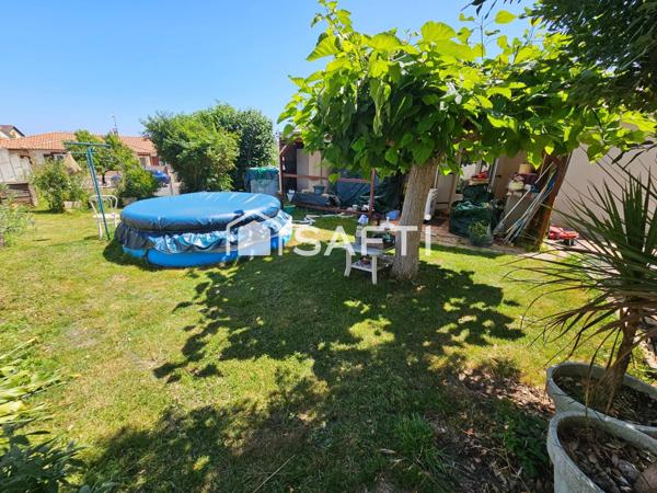 Maison plain pied avec garage proche du centre-ville