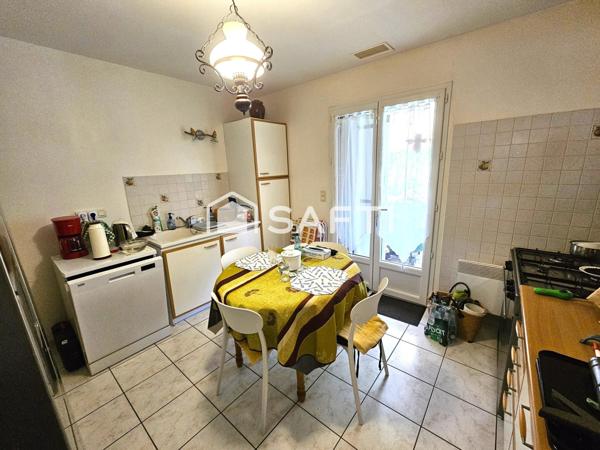 Maison plain pied avec garage proche du centre-ville