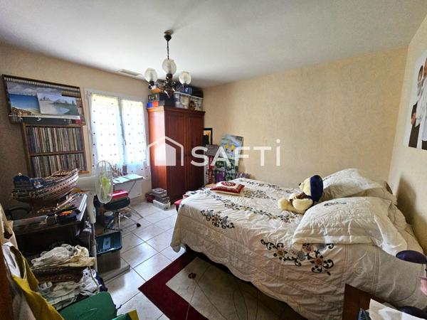 Maison plain pied avec garage proche du centre-ville