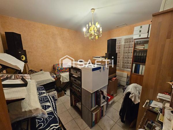 Maison plain pied avec garage proche du centre-ville