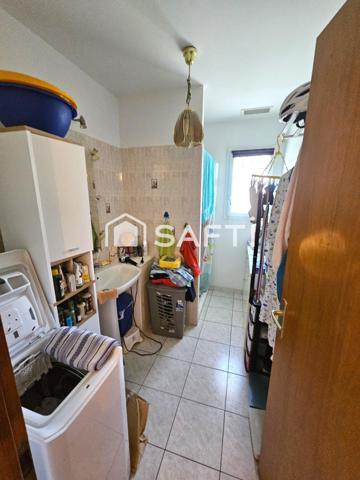 Maison plain pied avec garage proche du centre-ville