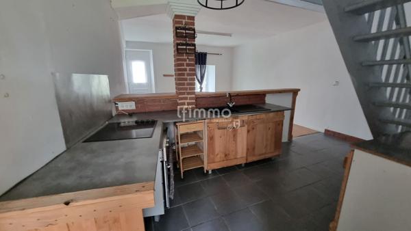 Maison avec grand terrain et potentiel équestre