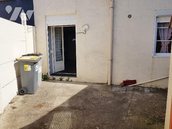 Plain pied de 76 m² habitable proche du centre ville avec garage.