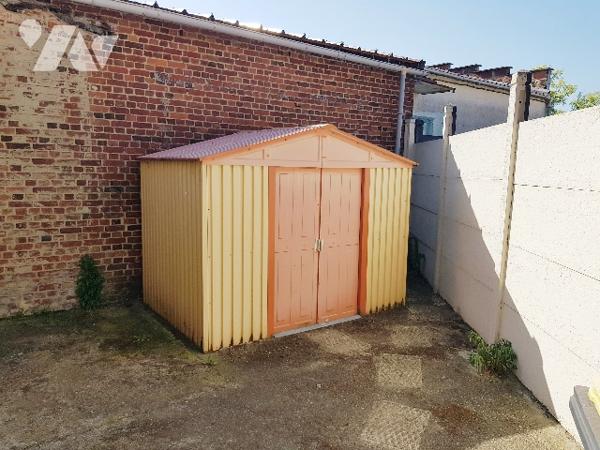 Plain pied de 76 m² habitable proche du centre ville avec garage.