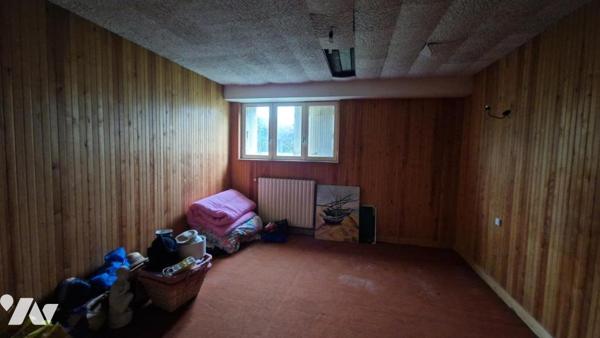 GRANDE MAISON DE 253 m² DIVISEE EN DEUX APPARTEMENTS AVEC GARAGE ET JARDIN