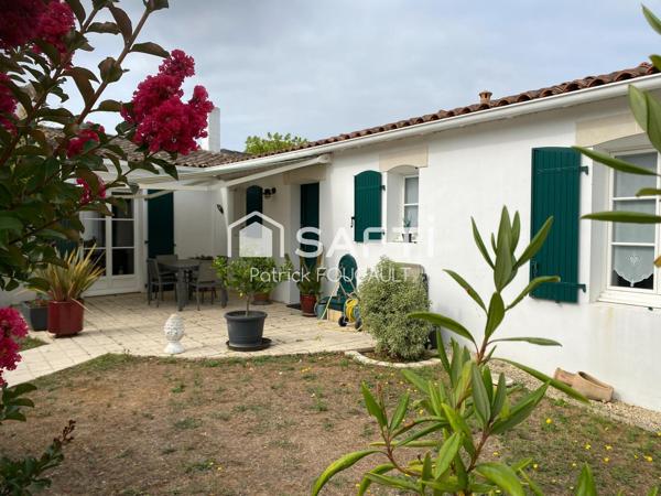 Maison Plain Pied + double garage sur terrain clos