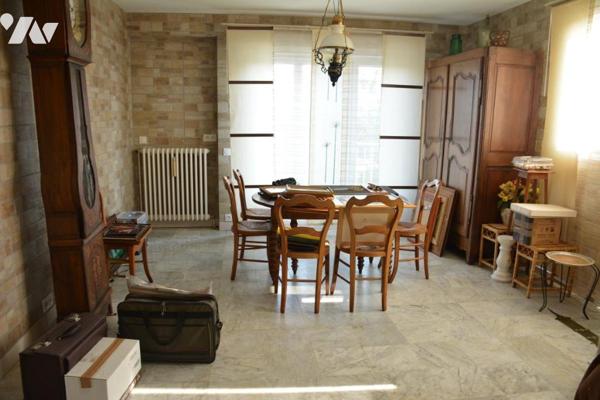 Vente sur la commune de Sablé sur Sarthe une maison avec un garage et un jardin