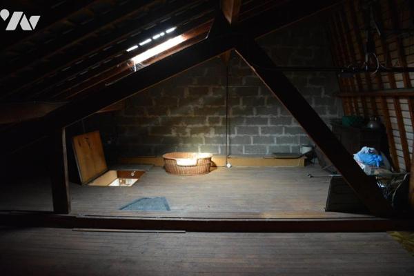 Vente sur la commune de Sablé sur Sarthe une maison avec un garage et un jardin