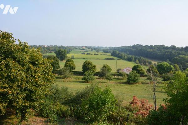 Vente sur la commune de Sablé sur Sarthe une maison avec un garage et un jardin