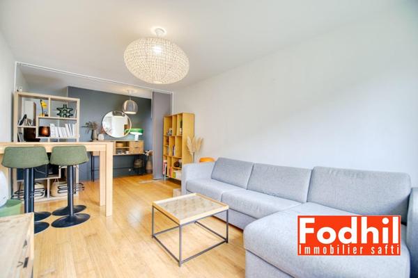 Appartement 3 pièces de 65m² avec cave et parking.