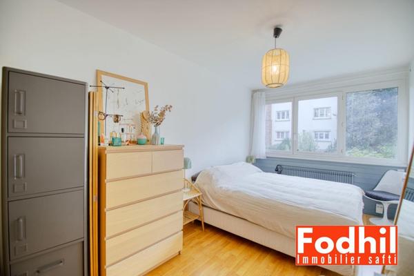 Appartement 3 pièces de 65m² avec cave et parking.