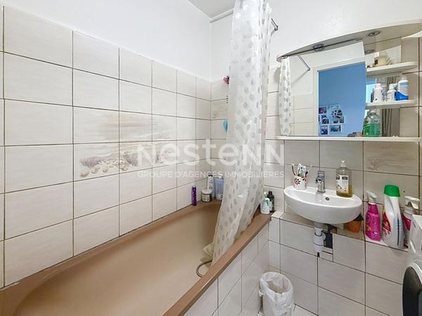 Appartement Traversant 4 Pièces avec Balcon et Cave - 69500 BRON