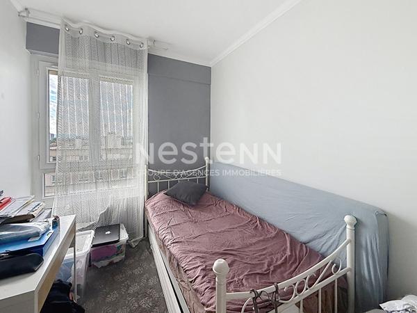 Appartement Traversant 4 Pièces avec Balcon et Cave - 69500 BRON