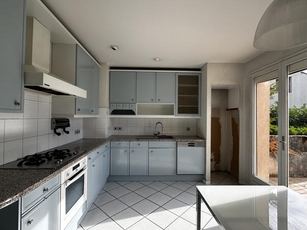 Maison comprenant un terrain divisible et constructible
