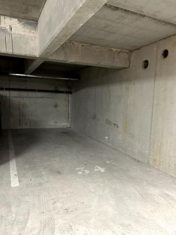 Place de stationnement en sous-sol sécurisé