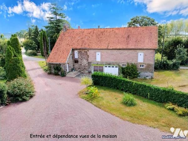 Maison d’habitation avec nombreuses dépendances sur terrain arboré avec mare