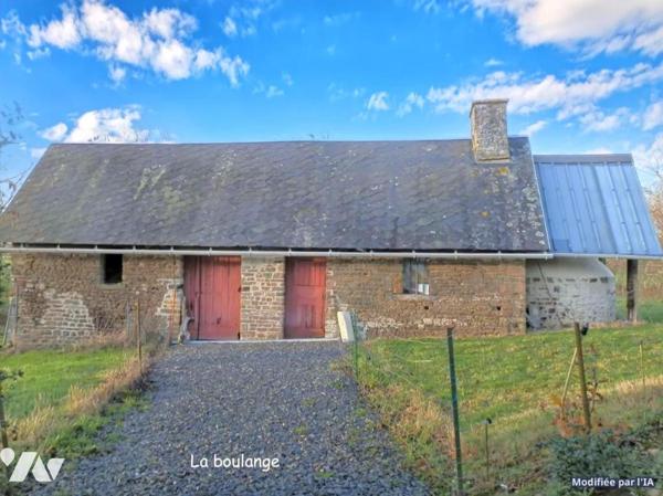 Maison d’habitation avec nombreuses dépendances sur terrain arboré avec mare