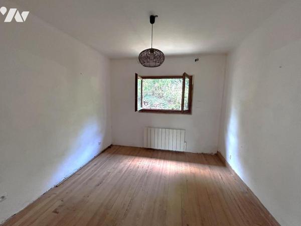 Maison de plain pied 3 chambres sur terrain de 13.5 ares à BREGILLE