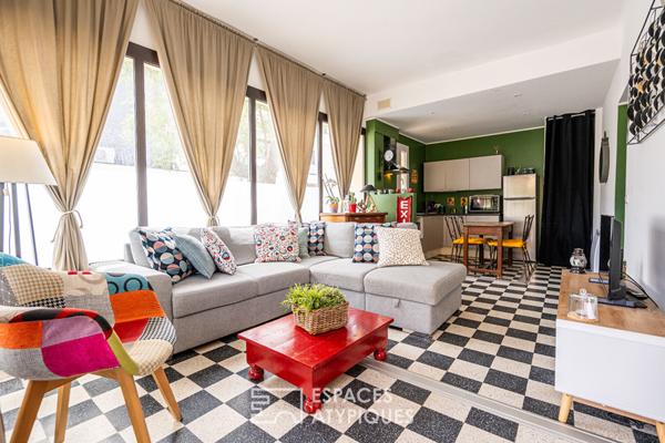 Ancienne boutique réhabilitée en appartement de charme avec terrasse