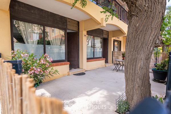 Ancienne boutique réhabilitée en appartement de charme avec terrasse