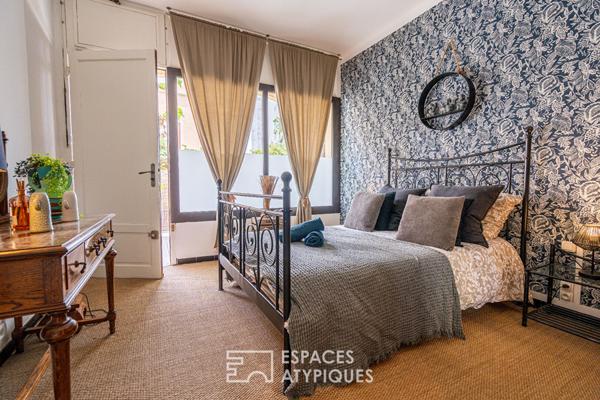 Ancienne boutique réhabilitée en appartement de charme avec terrasse