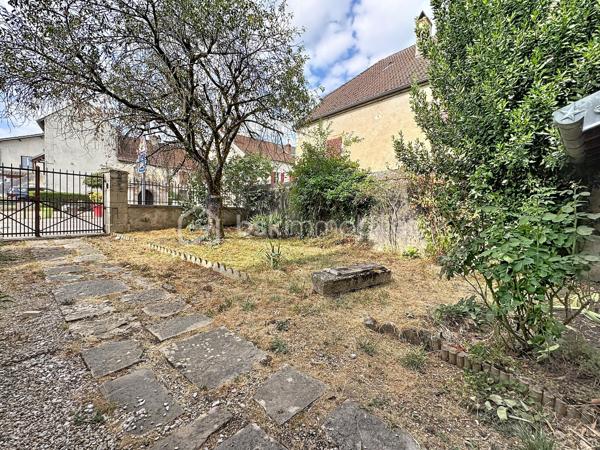 ✨En exclusivité chez BSK Immobilier

🏠Découvrez cette charmante maison de ville en pierre, pleine de caractère, offrant de beaux volumes et un fort potentiel d'aménagement.

Au rez-de-chaussée, vous trouverez une entrée desservant une jolie cuisine récente, aménagée et équipée, un salon/séjour lumineux, une chambre, une salle d'eau entièrement rénovée avec douche, meuble vasque et rangements, un bureau, un WC indépendant, une cave ainsi qu'un grand garage avec porte motorisée et un espace atelier.

À l'étage, la maison dispose de trois chambres, d'une spacieuse salle de bains avec WC et d'un vaste grenier aménageable, offrant de nombreuses possibilités d'agrandissement selon vos envies.

Son charmant terrain de 345 m2 saura vous séduire.

⭐ Les atouts de cette maison :

✅ Maison en pierre pleine de charme proche de toutes les commodités
✅ Cuisine récente aménagée et équipée
✅ Fenêtres PVC double vitrage au rez de chaussée
✅ Volets roulants électriques rez de chaussée et étage
✅ Tableau électrique refait
✅ Porte de garage motorisée
✅ Chaudière gaz récente
✅ Grand garage avec atelier
✅ Grenier offrant de nombreuses possibilités d'aménagement

🛠️ Quelques travaux de rénovation permettront de révéler tout le potentiel de cette maison et de créer un véritable cocon à votre image.

💙 Une belle opportunité à ne pas manquer ! Contactez-moi dès aujourd'hui pour organiser une visite et découvrir tout le potentiel de ce bien.