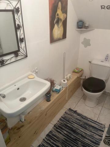 Pavillon sur sous-sol situé au calme centre-ville