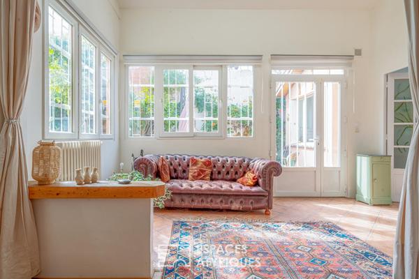 Maison type atelier avec jardin paysagé