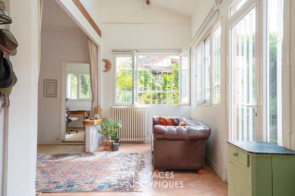 Maison type atelier avec jardin paysagé