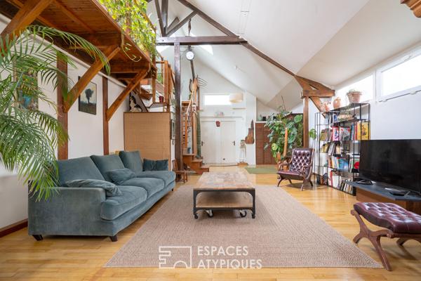 Maison type atelier avec jardin paysagé