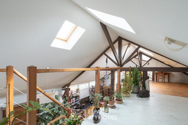 Maison type atelier avec jardin paysagé