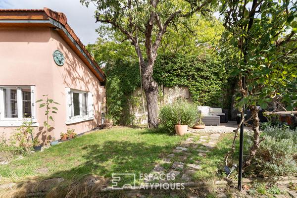 Maison type atelier avec jardin paysagé