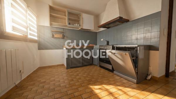 Bâtisse du XVIII siècle composé d'un local commercial et appartement