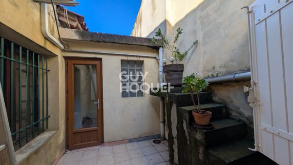 Bâtisse du XVIII siècle composé d'un local commercial et appartement